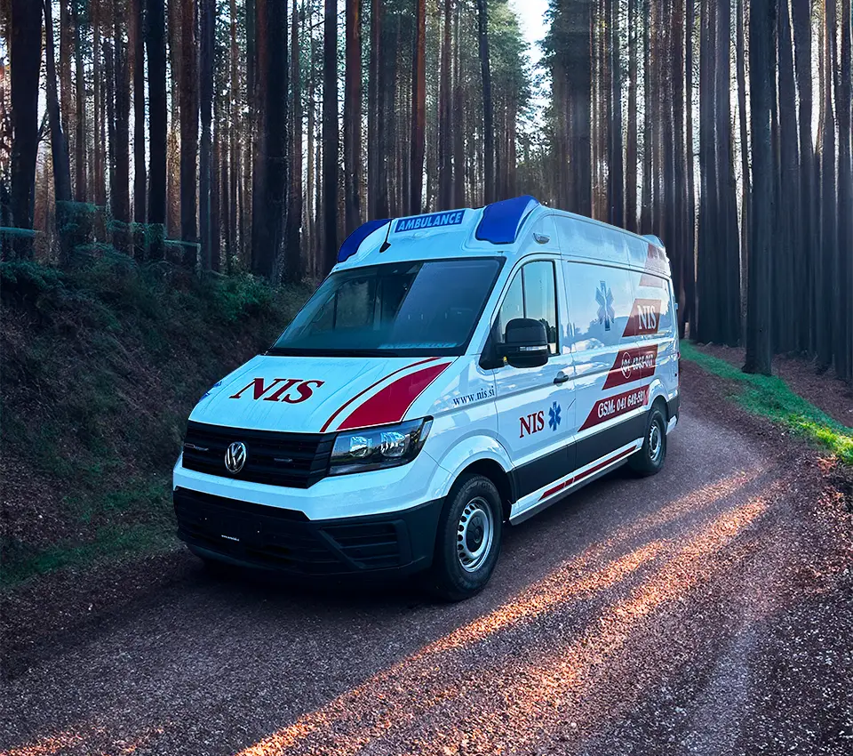 CIB Commerce Volkswagen Crafter emergency ambulance driving on a forest road