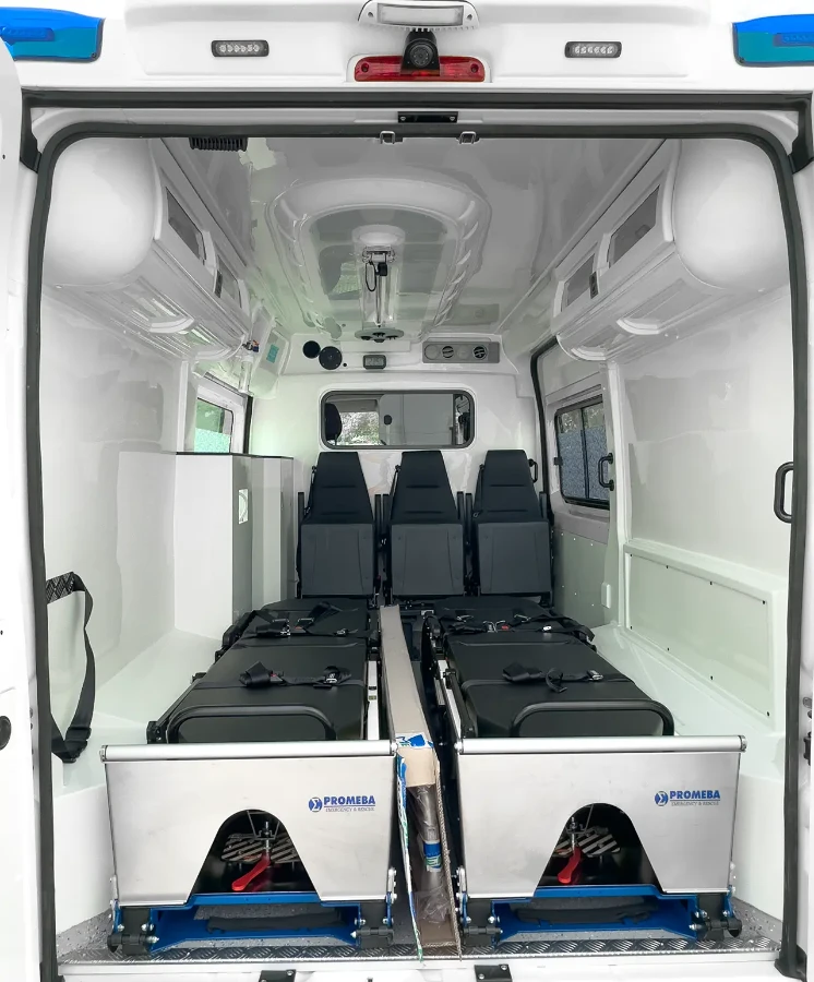 CIB Commerce patient transport ambulance interior with two stretchers and three seats